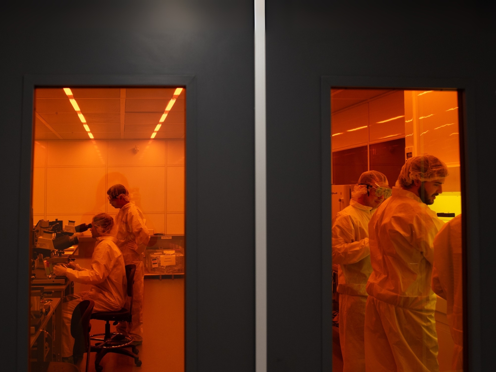 Students in a semiconductor clean room at the University of Texas at Austin