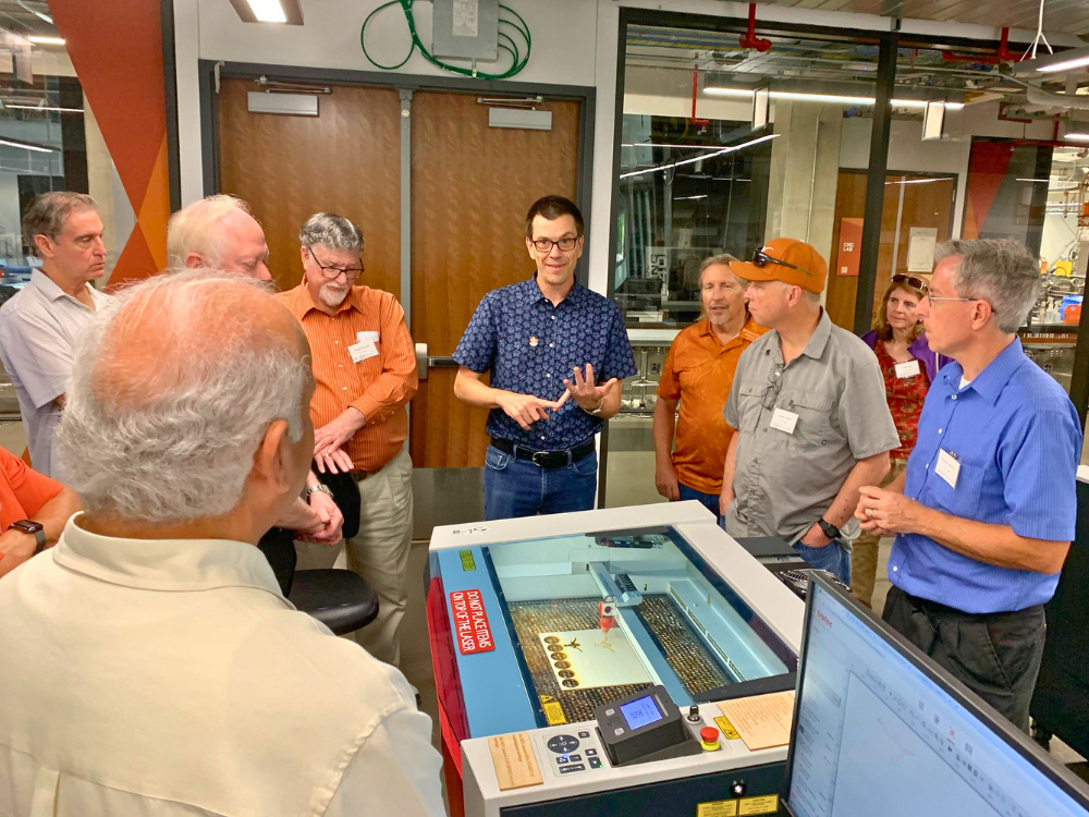 Attendees of the McKetta Luncheon tour lab space in EER