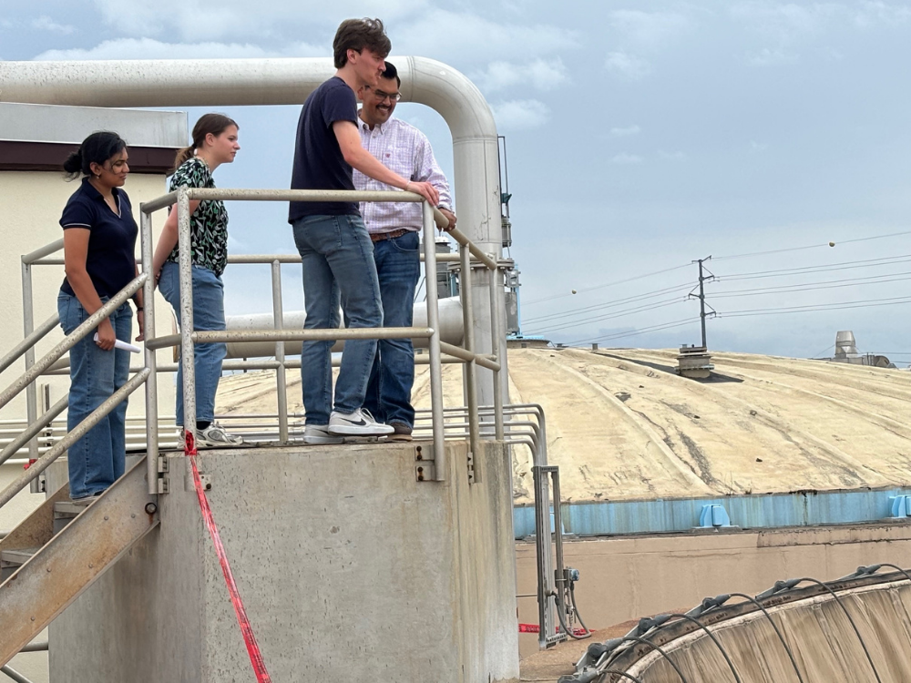 UT Students overlooking AD reactor at wastewater treatment plant