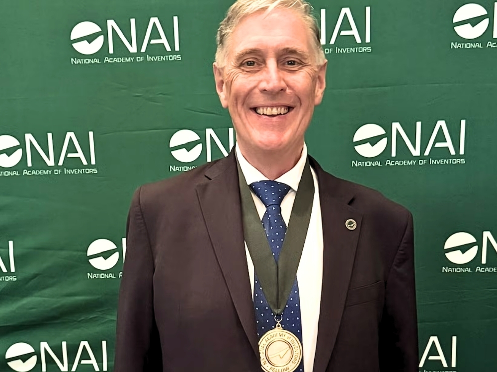 Benny Freeman beams at the National Academy of Inventors 2025 fellows induction